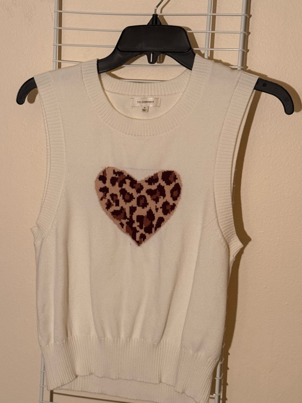 no comment. Cream Sleeveless Heart-Detail Knit Top